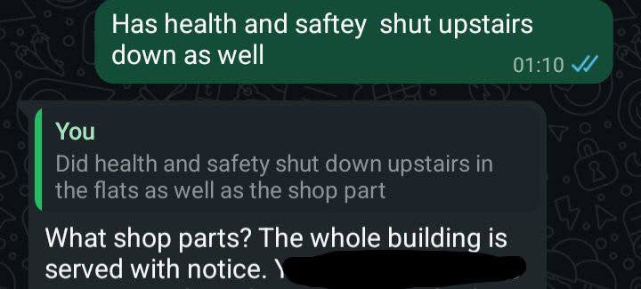 WhatsApp screenshot showing a sent message and a reply quoting different wording, with the response the whole building is served with notice